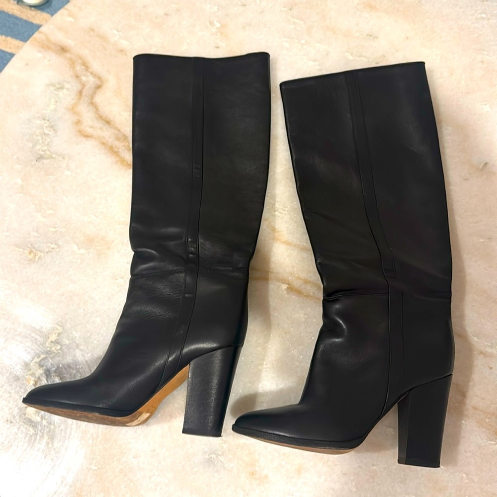 Black knee high 100% leather club monoco boots.
